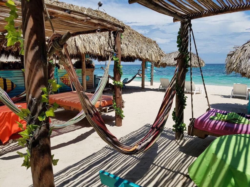 The Wizard & Bar Baru Hotel Playa Blanca Bagian luar foto