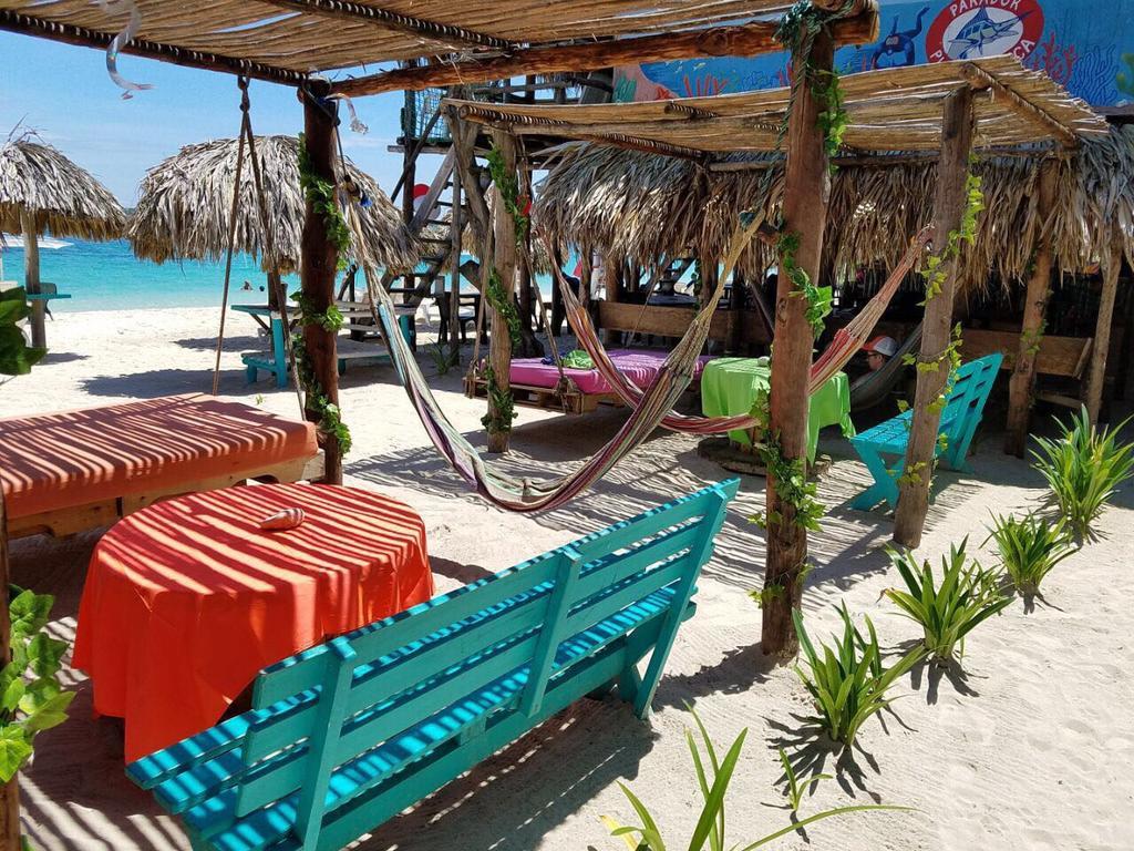The Wizard & Bar Baru Hotel Playa Blanca Bagian luar foto